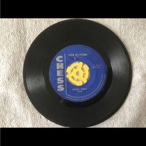 Vintage various 45rpm records.  No original sleeves.